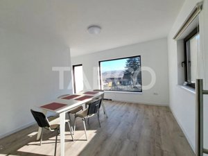 Casa spatioasa de inchiriat in Cisnadioara zona linisita 600 mp teren - imagine 6