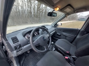 Suzuki Ignis 1.3 DDiS - imagine 8