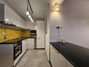 Apartament intim cu 2 camere in Bellevue Residence - imagine 2