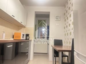 Apartament cu 3 camere, centrala proprie, zona Bd Cetatii - imagine 3