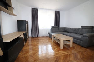 Apartament cu 3 camere si loc de parcare propriu.