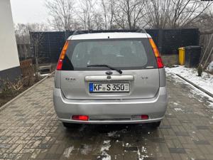 Subaru Justy 4x4    1.3 benzină   2006 - imagine 8
