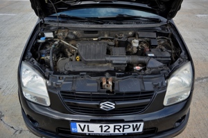 Suzuki Ignis 2005 - imagine 8