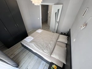 Apartarmentul trei camere -Titan - imagine 2