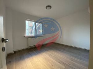 Apartament spațios, nemobilat, ideal pentru  birouri sau activități diverse - imagine 5