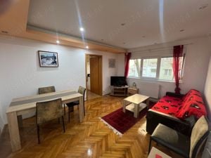 închiriez apartament cu 2 camere 