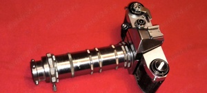 pt. confectionat veioza  aparat foto praktica + obiectiv obiectivul este confectionat pe strung 