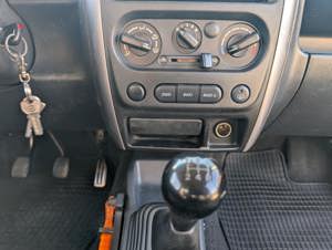 Suzuki Jimny 1.3 Benzina 4x4 - imagine 7