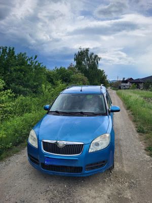 Vând Skoda Roomster