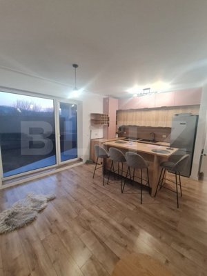 Apartament nou, 55 mp utili, gradina si terasa 97 mp, garaj subteran - imagine 2