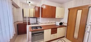 Inchiriez apartament 3 camere, zona Decebal, decomandat, dotat cu aer conditionat - imagine 3