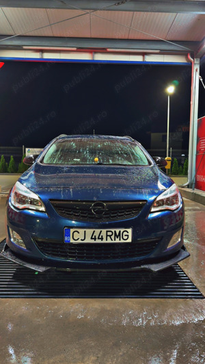 Opel Astra J SportTourer - imagine 4