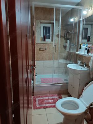 Vând apartament cu 3camere+garaj