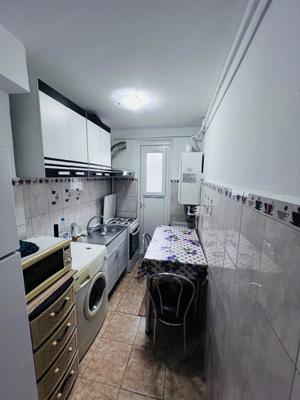 Inchiriem apartament cu 2 camere Micro 19 parter cu gradina( Neacsu), pret 1500 lei - imagine 10