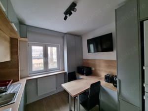 Închiriez apartament 3 camere - imagine 2