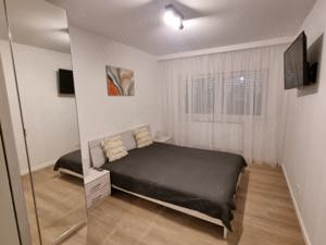 Închiriez apartament 3 camere - imagine 9