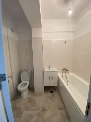 Apartament 3 camere, doua bai, bucatarie de 14 mp si balcon spatios - imagine 9