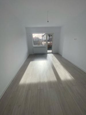 Apartament 3 camere, doua bai, bucatarie de 14 mp si balcon spatios - imagine 11