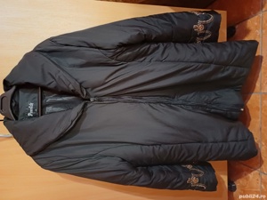 Vand geaca groasa, de femei, XL in stare foarte bună.