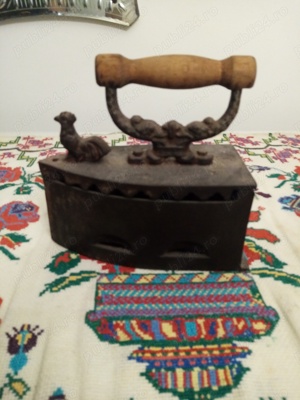 Fier de călcat cu cărbune 