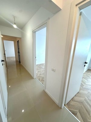  Apartament modern cu 3 camere   73 mp utili, complet renovat, ultra-luminos, vis-a-vis de Grand Are - imagine 3