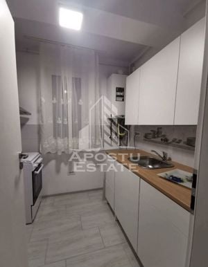 Apartament cu doua camere in zona Calea Urseni, decomandat - imagine 4