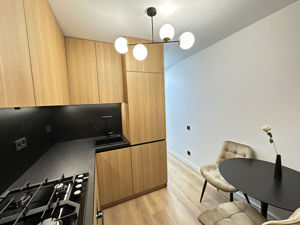 Oferim spre vanzare un apartament cu 2 camere - imagine 4