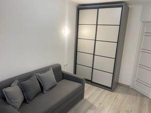 Oferim spre inchiriere un  apartament cu 2 camere - imagine 2