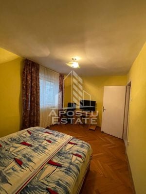 Apartament cu 2 camere, etaj intermediar,centrala ,zona Dambovita - imagine 3