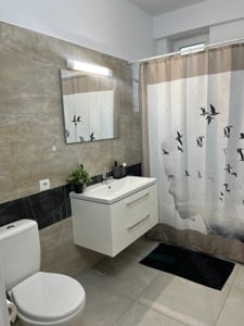 Închiriez apartament modern, 3 camere + parcare subterană - imagine 5