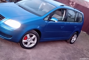 Touran, 7 locuri  1.9 tdi