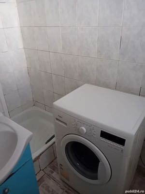 garsoniera curte - imagine 2