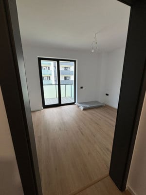 Apartament 56.50 mp + balcon 10 mp, Finisat, zona semicentrala - imagine 2