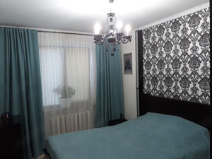 Va oferim spre inchiriere un apartament cu 2 camere - imagine 2