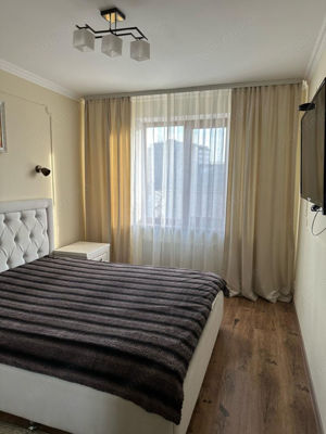 inchiriere un apartament cu 2 camere cartierul Coresi - imagine 3