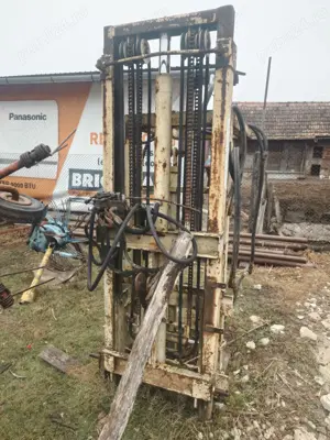 Elevator/ stivuitor în tiranț la tractor cu distribuitor propriu - imagine 7