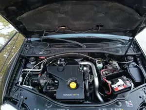 Dacia Duster 1.5 dCi Laureate 110 Cp euro 5,4WD,AC,geamuri el.,jenti aliaj,volan piele - imagine 9 Dacia Duster 1.5 dCi Laureate 110 Cp euro 5,4WD,AC,geamuri el.,jenti aliaj,volan piele - imagine 9