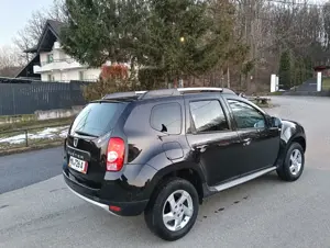 Dacia Duster 1.5 dCi Laureate 110 Cp euro 5,4WD,AC,geamuri el.,jenti aliaj,volan piele - imagine 7 Dacia Duster 1.5 dCi Laureate 110 Cp euro 5,4WD,AC,geamuri el.,jenti aliaj,volan piele - imagine 7