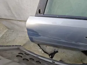 Usa fata stanga - Opel Zafira B - cu defect  - imagine 2