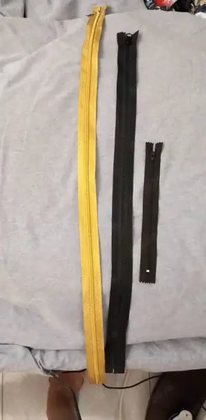 Vand fermoare lungi negre si aurii