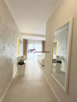 Apartament cu 3 camere, finisaje si mobilier premium 56 mp plus terasa 12 mp etaj intermediar in Flo