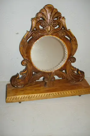 Oglinda rotunda cu rama sculptata din lemn - imagine 1