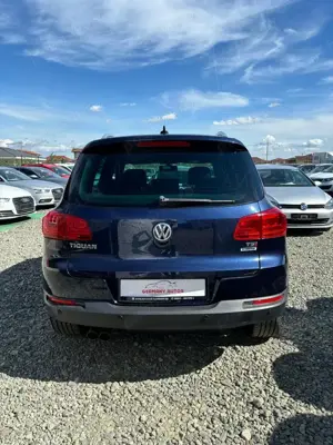Volkswagen Tiguan 1.4 TSI BlueMotion Technology Lounge Sport & Style - imagine 8