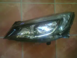 Faruri originale Opel Astra J(2009-2015)1LG010011-69HELLA - imagine 9