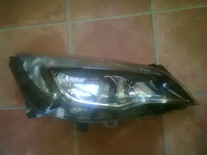 Faruri originale Opel Astra J(2009-2015)1LG010011-69HELLA - imagine 10