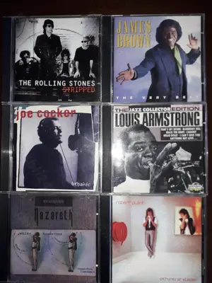 CD-uri Elton John,Smokie,Joe Cocker,Smokie,James Brown,Eric Clapton,Rolling Stones,Julio Iglesias