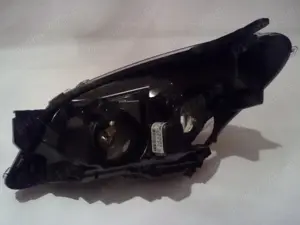 Faruri originale pe fond negru Opel Astra H - HELLA(2004-2014) - imagine 3