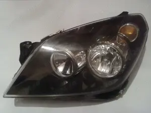 Faruri originale pe fond negru Opel Astra H - HELLA(2004-2014) - imagine 5