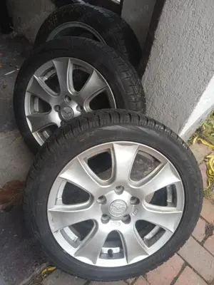 Jenti Aluminiu Mazda cu anvelope de iarna 