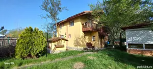 Casa la curte cu teren generos